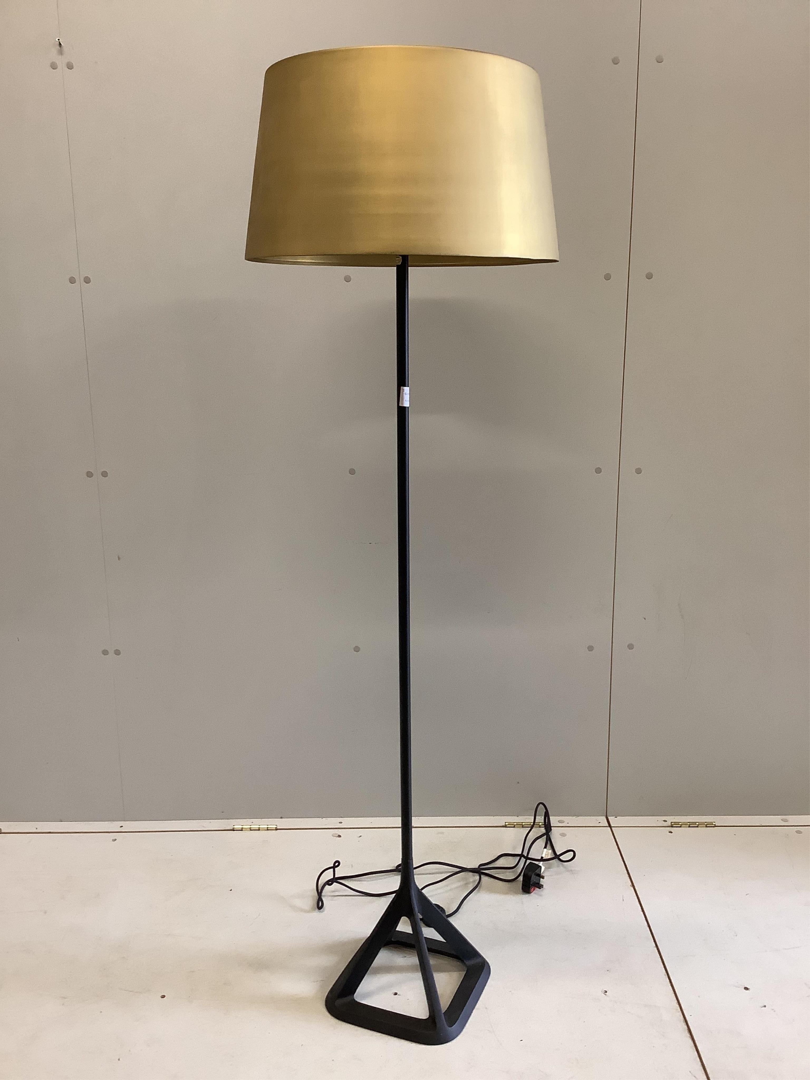 A Tom Dixon standard lamp with satin shade